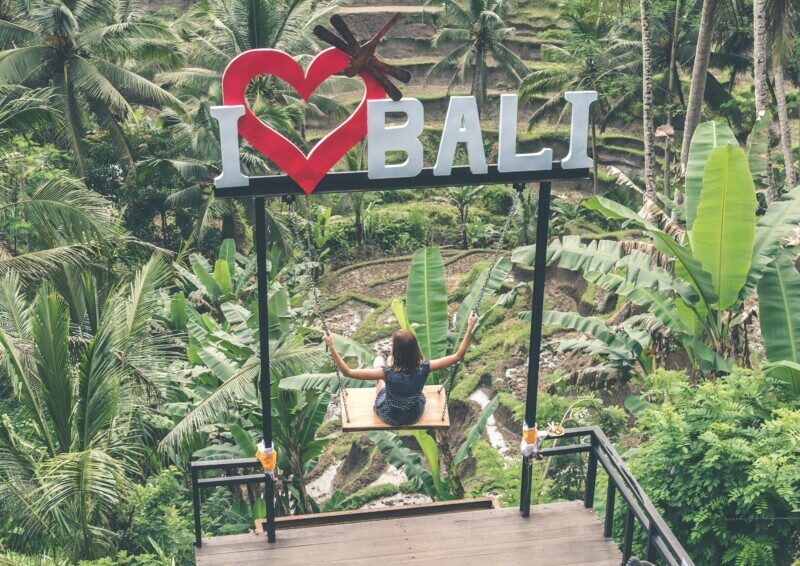 a woman swinging in Bali